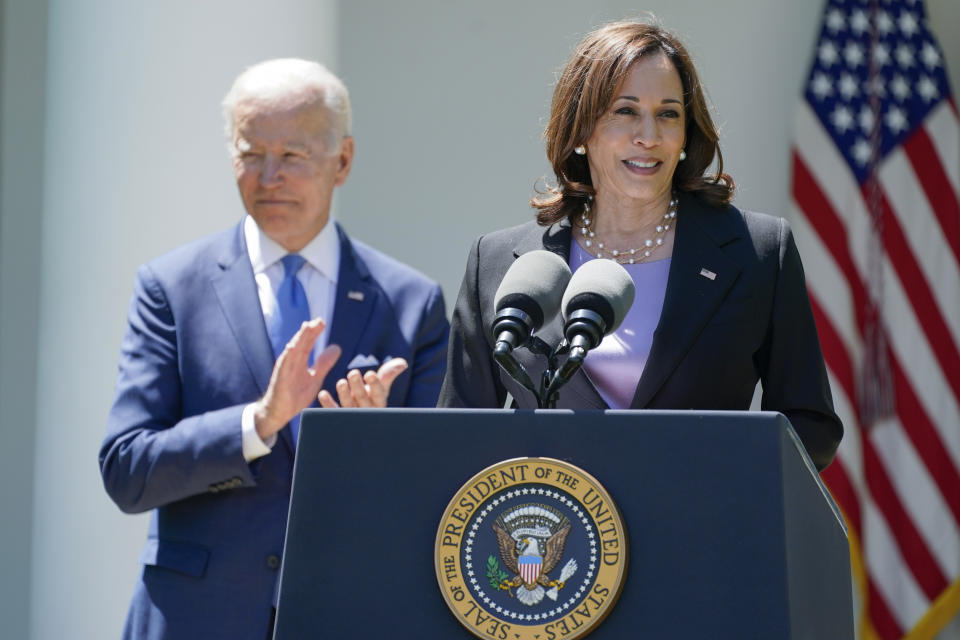 President Joe Biden applauds as Vice President Kamala Harris speaks at an event on lowering the cost of high-speed internet in the Rose Garden of the White House, Monday, May 9, 2022, in Washington. (AP Photo/Manuel Balce Ceneta)