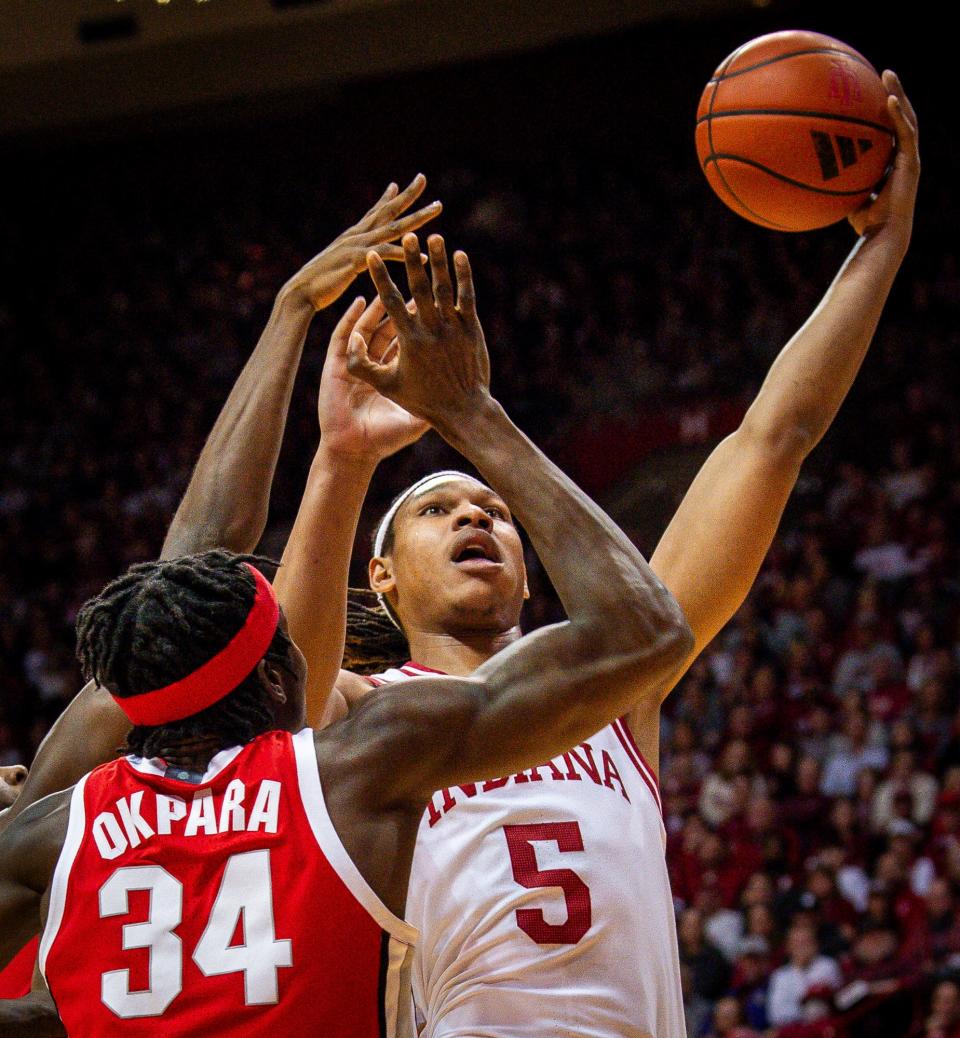 Indiana's Malik Reneau (5) shoots over Ohio State's Felix Okpara (34) during the first half of the Indiana versus Ohio State men's basketball game at Simon Skjodt Assembly Hall on Saturday, Jan. 6, 2024.