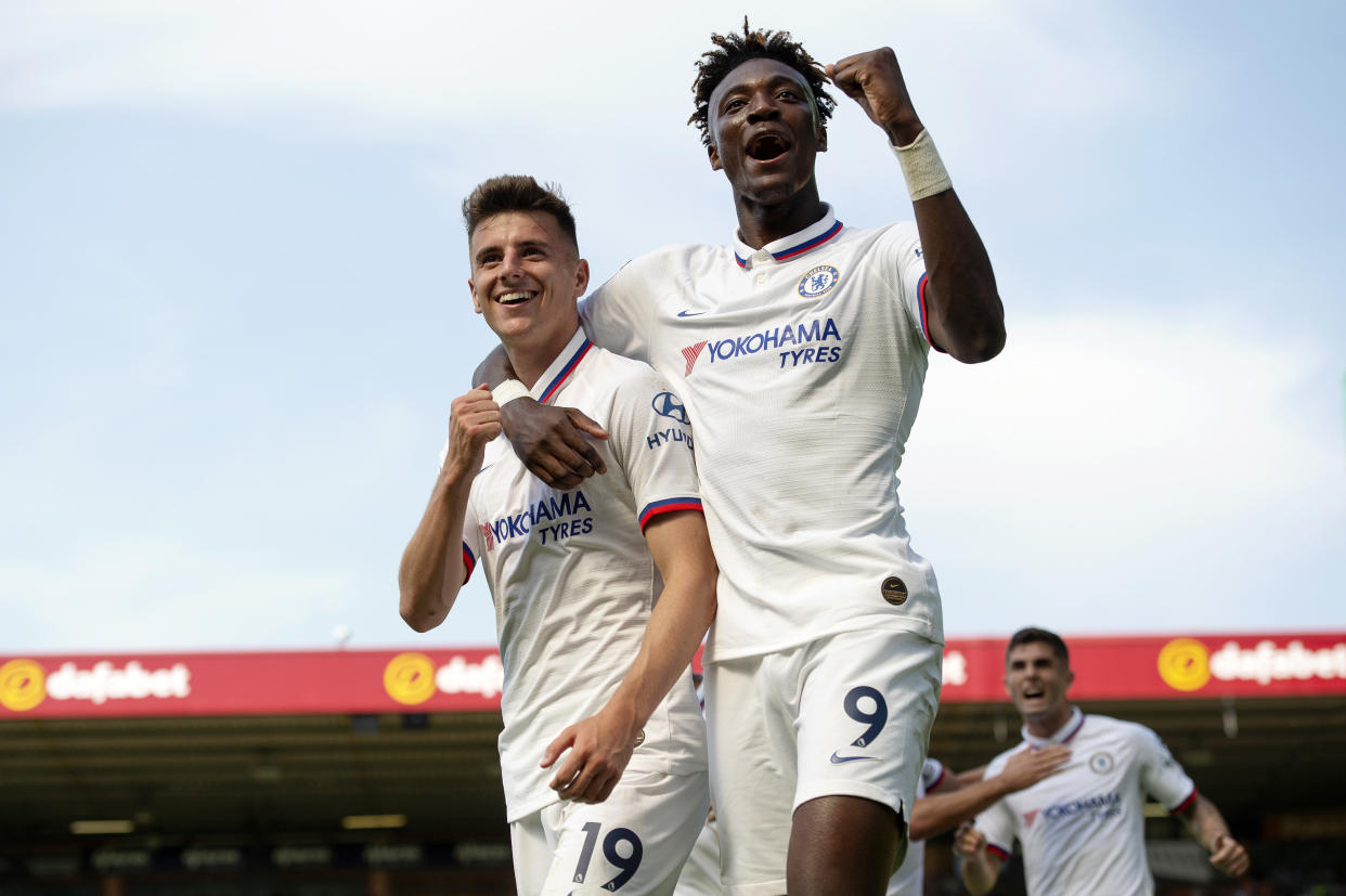 NORWICH, ENGLAND - AUGUST 24: Mason Mount and Tammy Abraham of Chelsea celebrate after scoring their team's second goal during the Premier League match between Norwich City and Chelsea FC at Carrow Road on August 24, 2019 in Norwich, United Kingdom. (Photo by Chelsea Football Club/Chelsea FC via Getty Images)