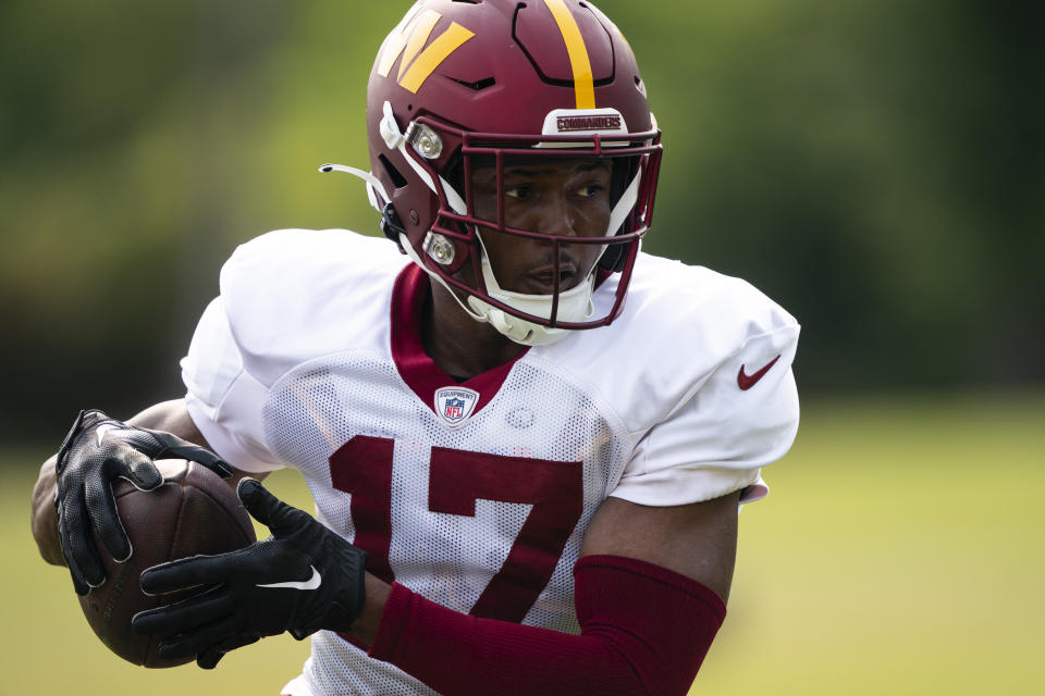 Washington Commanders wide receiver Terry McLaurin catches a pass during an NFL football practice at the team's training facility, Tuesday, Aug. 1, 2023, in Ashburn, Va. (AP Photo/Evan Vucci)