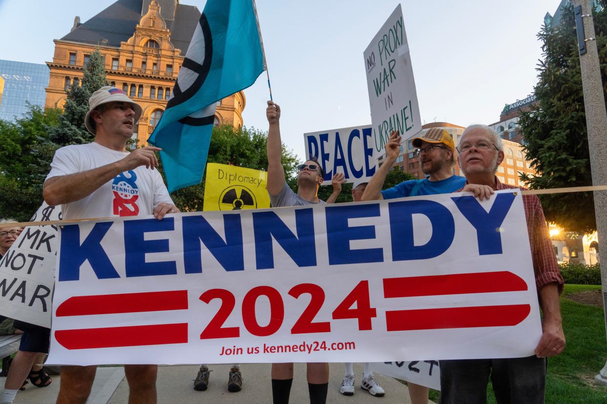 Supporter of Democratic presidential hopeful Robert F. Kennedy, Jr. chant about seeking a debate with President Biden as about 250 people take part in a rally and protest march as a counterpoint to the Republican presidential primary debate Wednesday, August 23, 2023 in downtown Milwaukee, Wis. The party’s first primary debate was held nearby at Fiserv Forum.