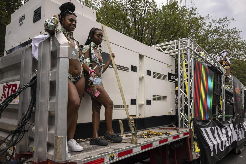 People in costume participate in the West Indian Day Parade, Monday, Sept. 4, 2023, in the Brooklyn borough of New York. The largest U.S. celebration of Caribbean culture is held in New York City, as steel bands, floats and flamboyantly costumed revelers take to the streets in the West Indian Day parade. (AP Photo/Yuki Iwamura)