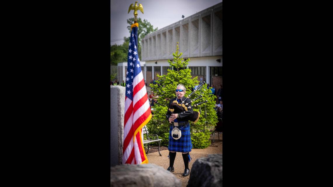 Patty Bratcher plays the bagpipes during the St. Clair County Law Enforcement Memorial Service Tuesday in Belleville.