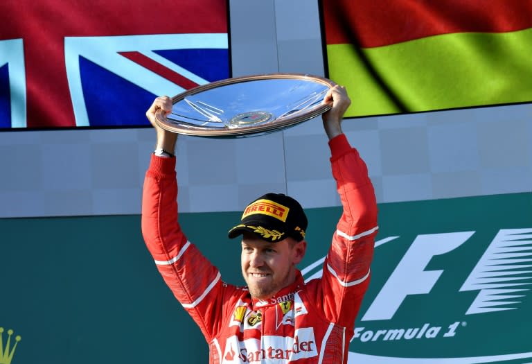 Ferrari's Sebastian Vettel celebrates his victory in the Australian Grand Prix on March 26, 2017