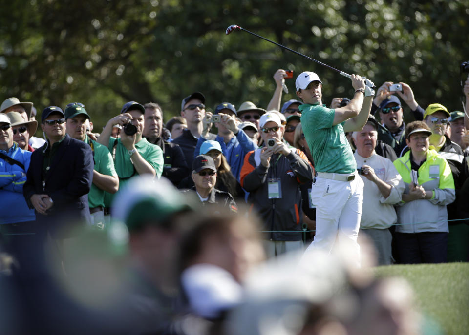 Rory McIlroy, of Northern Ireland, tees off on the 10th hole during a practice round for the Masters golf tournament Wednesday, April 9, 2014, in Augusta, Ga. (AP Photo/David J. Phillip)