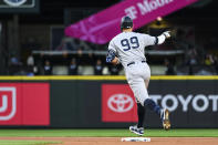 New York Yankees' Aaron Judge runs the bases after hitting a solo home run against the Seattle Mariners during the seventh inning of a baseball game Tuesday, May 30, 2023, in Seattle. (AP Photo/Caean Couto)