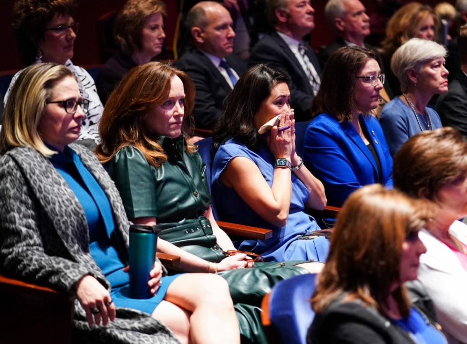 Lawmakers look on with emotion as they watch the video of the atrocities (POOL/AFP via Getty Images)