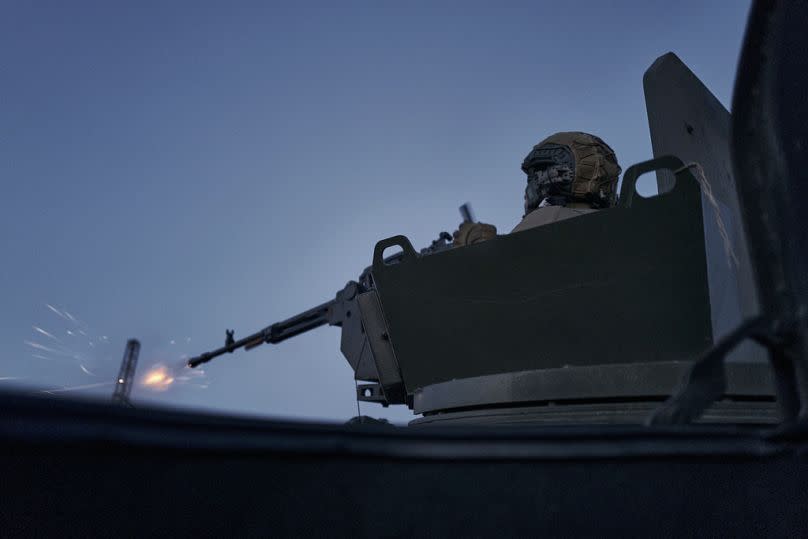 A Ukrainian soldier fires during battle in Avdiivka, Donetsk region, Ukraine.