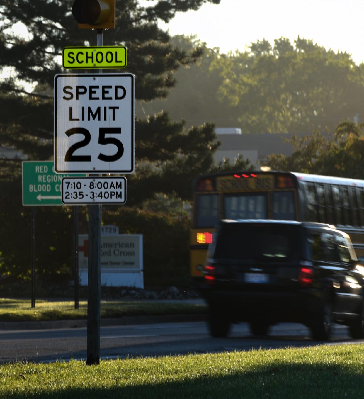 Traffic moves east down South M-43 near Marshall Street in front of Lansing Eastern High School, Thursday morning, Aug. 31, 2023.