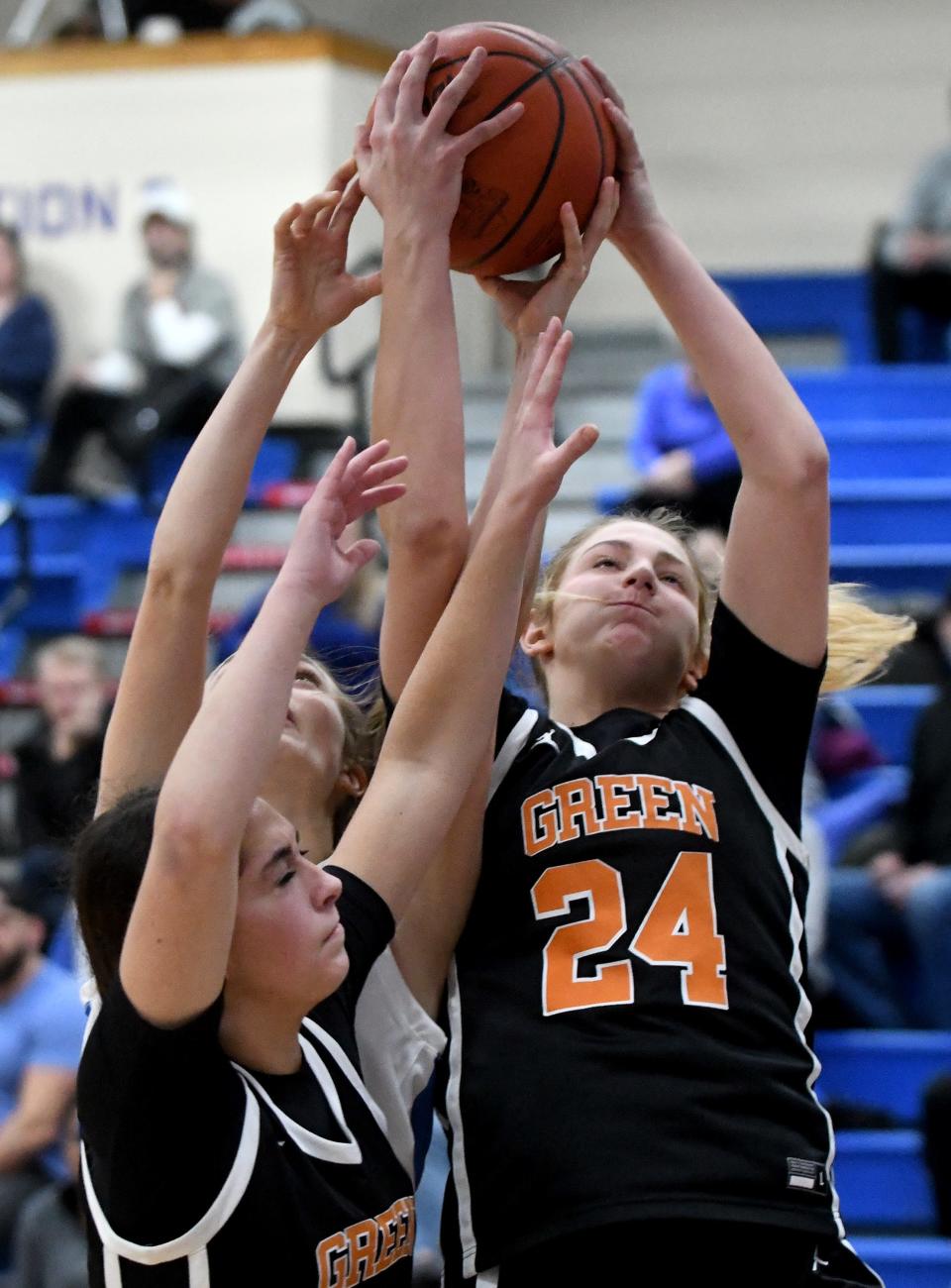 Green's Jenna Slates pulls down a rebound in the first quarter against Lake on Dec. 20, 2023, in Green.
