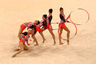 BEIJING - AUGUST 22: Team Belarus competes in the Group All-Around Qualification round of the Rhythmic Gymnastics event at the Beijing University of Technology Gymnasium on Day 14 of the Beijing 2008 Olympic Games on August 22, 2008 in Beijing, China. (Photo by Vladimir Rys/Bongarts/Getty Images)