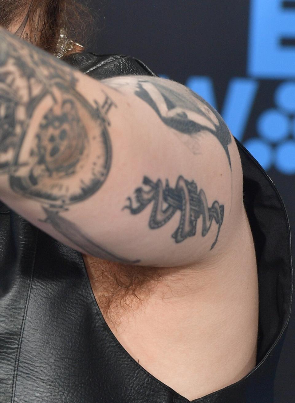 Post Malone attends the 2017 BET Awards at Microsoft Theater on June 25, 2017 in Los Angeles, California (tattoo detail)