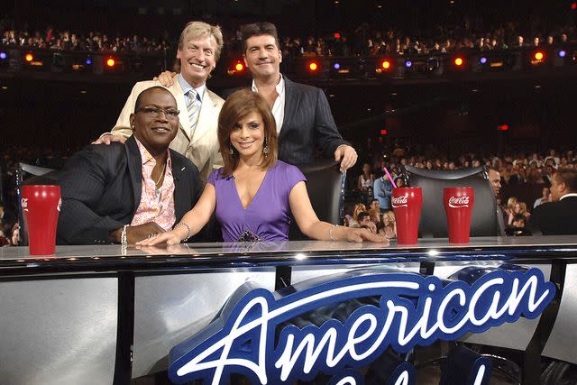 <p>Ray Mickshaw/WireImage</p> Paula Abdul on the 'American Ido'l set with fellow judges. Nigel Lythgoe is standing on the left.