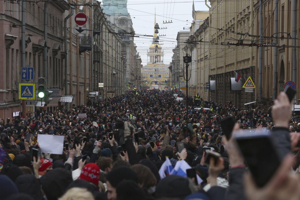 People attend a protest against the jailing of opposition leader Alexei Navalny in in St. Petersburg, Russia, Sunday, Jan. 31, 2021. Thousands of people have taken to the streets across Russia to demand the release of jailed opposition leader Alexei Navalny, keeping up the wave of nationwide protests that have rattled the Kremlin. Hundreds have been detained by police. (AP Photo/Valentin Egorshin)