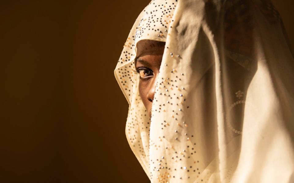 Fatima, 17, (not her real name) was abducted by Boko Haram when she was only 10 years old. She was also forced to watch and participate in executions and fighting. Aged 14 she was given an explosive vest and shown how to use it. - Simon Townsley/The Telegraph