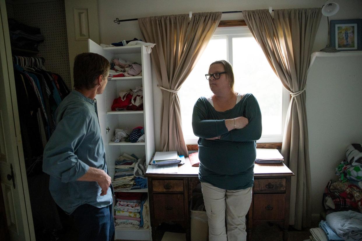 Craig Coburn-McDonald speaks to his sister Melissa McDonald about her living arrangement, in the guest room he converted for her in his home. The last person to live here was his mother-in-law, who died just over four months ago.