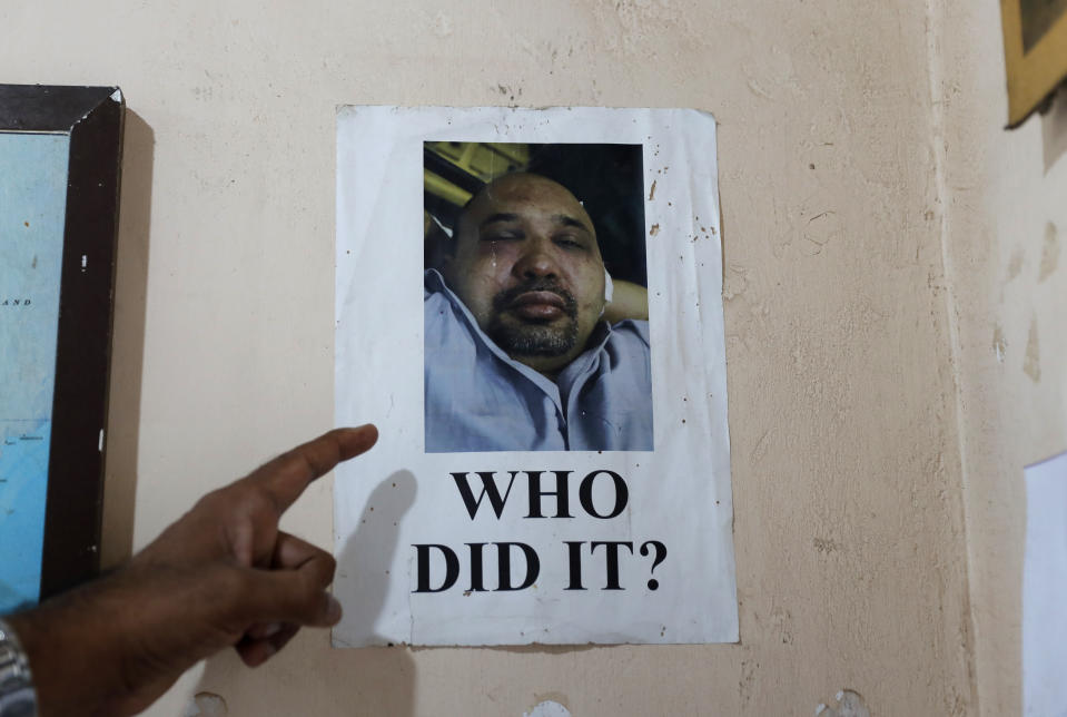 In this Nov. 6, 2019 photo, a portrait of Sri Lankan journalist Keith Noyahr who left the country following an alleged attack by a group of government soldiers is seen pasted on the wall of a human rights activist's office in Colombo, Sri Lanka. Forced to flee their country a decade ago to escape allegedly state-sponsored killer squads, Sri Lankan journalists living in exile doubt they’ll be able to return home soon or see justice served to their tormentors _ whose alleged ringleader could come to power in this weekend’s presidential election. Exiled journalists and media rights groups are expressing disappointment over the current government’s failure in punishing the culprits responsible for crimes committed against media members. (AP Photo/Eranga Jayawardena)