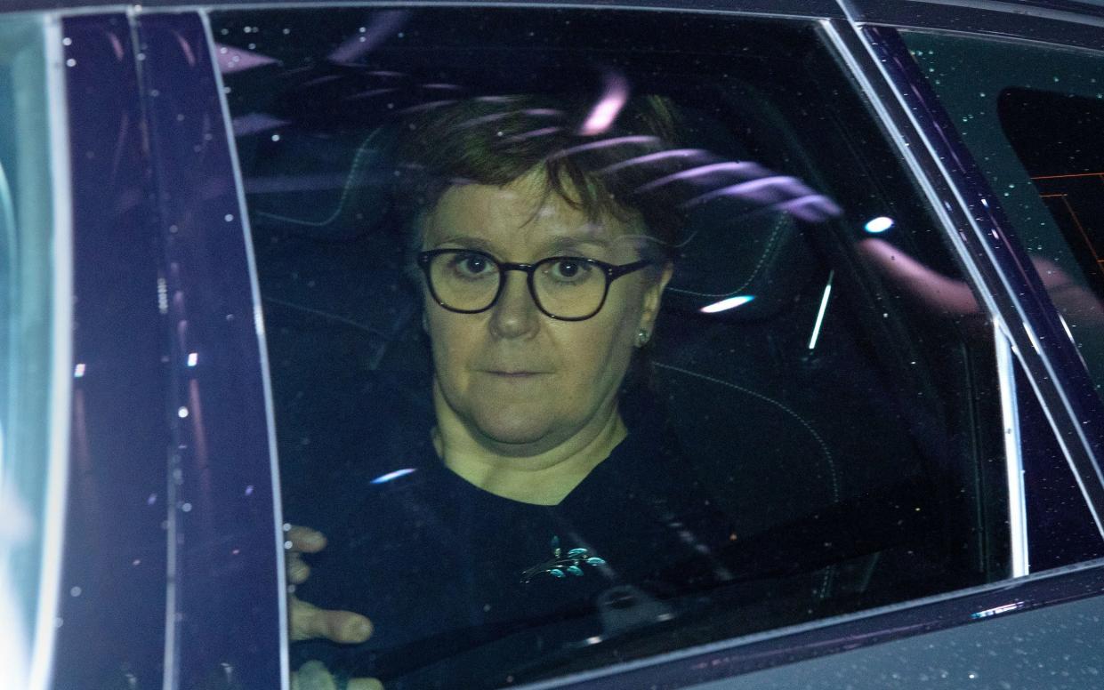 Nicola Sturgeon leaves by car after giving evidence at the Covid Inquiry at Edinburgh International Conference Centre