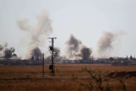 Smoke rises after strikes on Syria Democratic Forces (SDF) controlled Tell Rifaat town, northern Aleppo province, Syria October 21, 2016. REUTERS/Khalil Ashawi