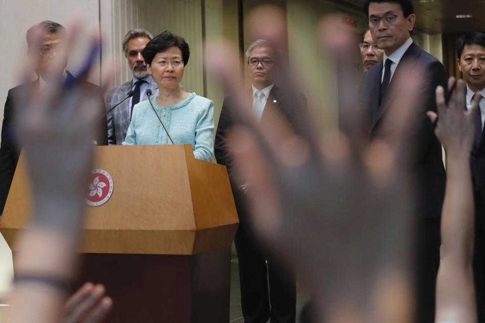 Hong Kong Chief Executive Carrie Lam waits for questions during a press conference in Hong Kong Friday, Aug. 9, 2019. Lam said her priority is to “stop the violence” rather than make political concessions as the city’s 2-month-long protest movement continued with a demonstration at the airport. (AP Photo/Kin Cheung)