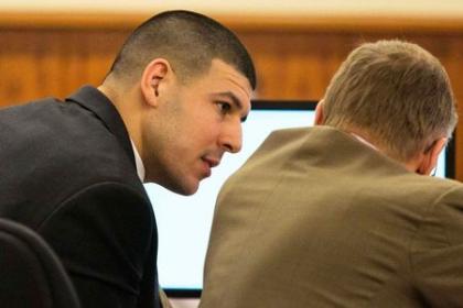 Aaron Hernandez consults his attorney during his murder trial. (REUTERS)