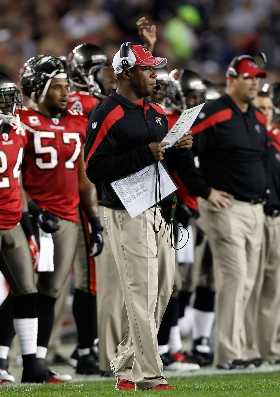 TAMPA, FL - DECEMBER 17:  Head coach Raheem Morris of the Tampa Bay Buccaneers directs his team against the Dallas Cowboys during the game at Raymond James Stadium on December 17, 2011 in Tampa, Florida.  (Photo by J. Meric/Getty Images)