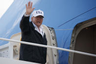 <p>President Donald Trump waves as he boards Air Force One for a trip to Florida to meet with first responders and people impacted by Hurricane Irma, Thursday, Sept. 14, 2017, in Andrews Air Force Base, Md. (Photo: Evan Vucci/AP) </p>