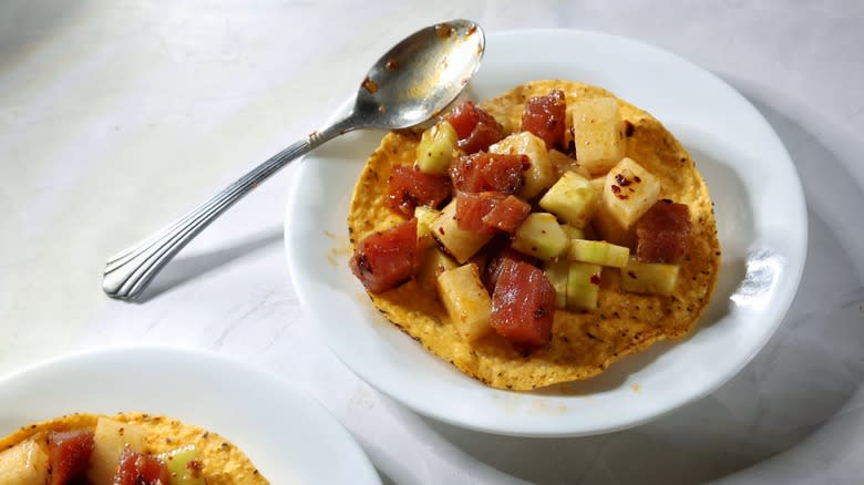 plated tuna tostada with spoon