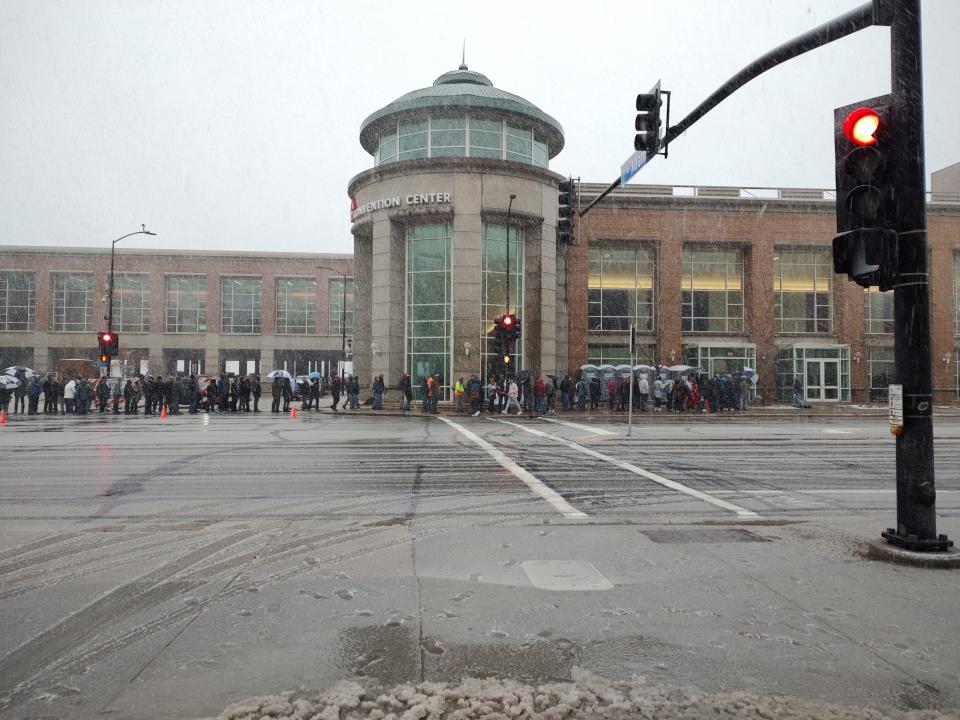 Trump supporters stand in line in driving snow on Tuesday, April 2, 2024, outside the KI Convention Center in downtown Green Bay.