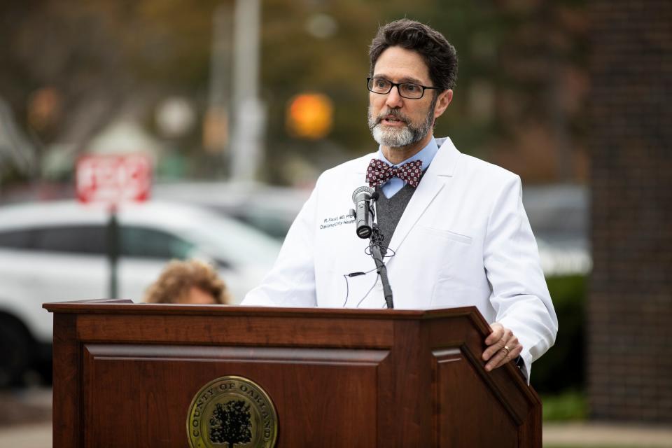 Dr. Russell Faust, Oakland County Health Division's medical director, speaks at a news conference in Southfield on Thursday, Nov. 4, 2021.