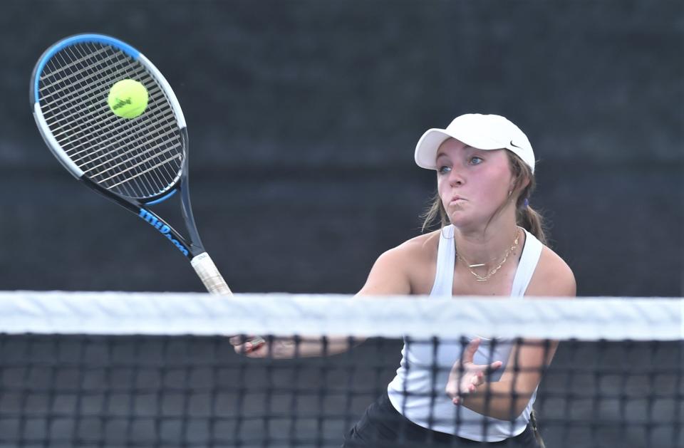 Abilene Wylie's Stealey Crousen hits the ball in her mixed doubles match against College Station's Maya Diyasheva and Paxton O'Shea. The College Station duo won the Class 5A championship match 4-6, 6-3, 6-4 on Wednesday at Northside Tennis Center in Helotes.