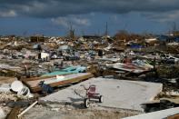 FILE PHOTO: A child's bicycle is seen in a destroyed neighborhood in the wake of Hurricane Dorian in Marsh Harbour