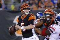 FILE - In this Aug. 22, 2019, file photo, Cincinnati Bengals quarterback Ryan Finley (5) looks to pass during the first half of an NFL preseason football game against the New York Giants, in Cincinnati. The winless Bengals benched Andy Dalton heading into their bye week, ending his nine-season run as starter so they can start developing rookie Ryan Finley as his potential long-term replacement. The move came two days after a 24-10 loss to the Rams in London left Cincinnati 0-8 for the first time in 11 years. (AP Photo/Frank Victores, File)