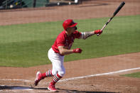 St. Louis Cardinals' Tyler O'Neill watches after hitting a three-run home run during the seventh inning of a spring training baseball game against the Houston Astros, Sunday, March 7, 2021, in Jupiter, Fla. (AP Photo/Lynne Sladky)