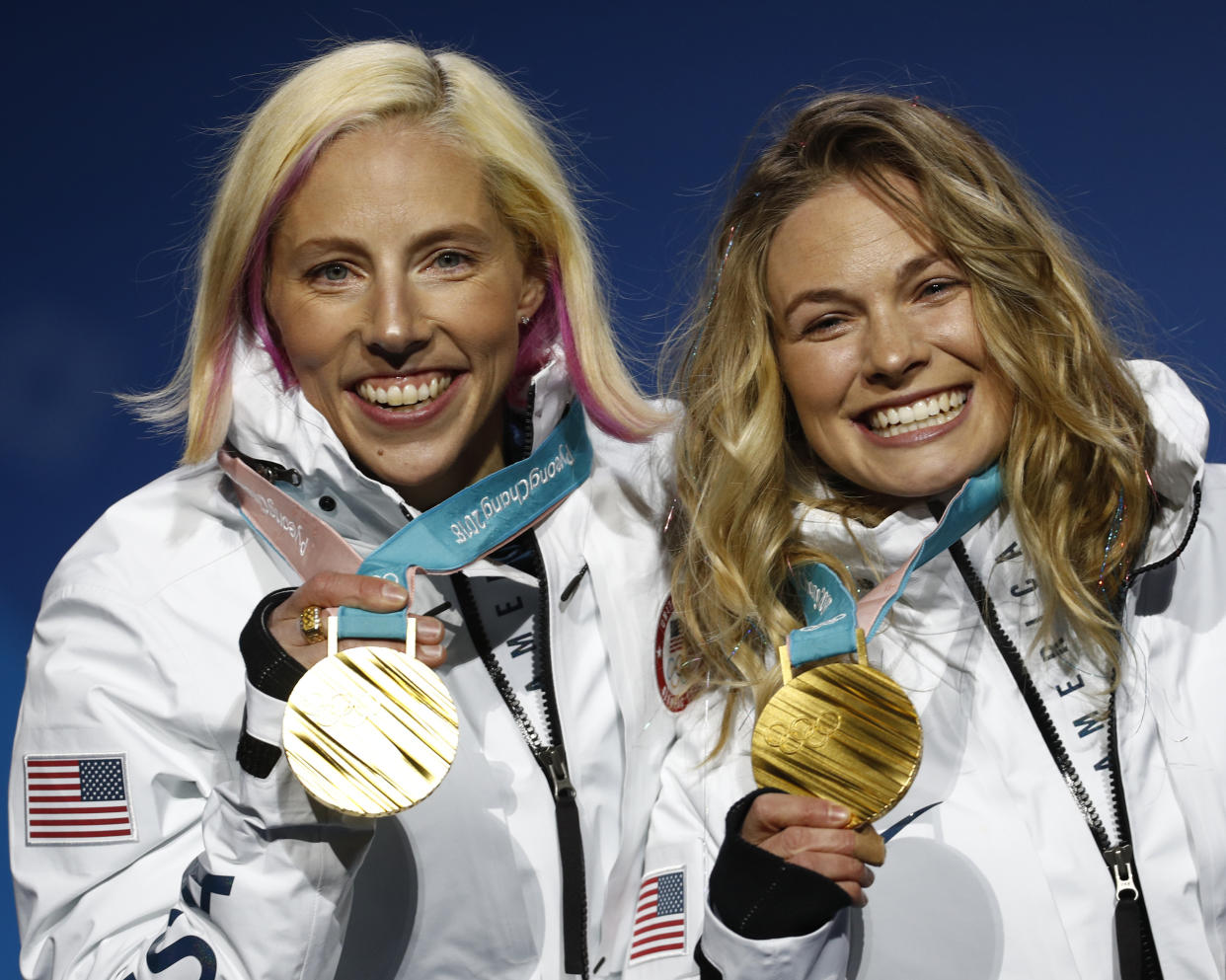 Gold medalists in the women’s team sprint freestyle cross-country skiing Kikkan Randall and Jessica Diggins at the 2018 Winter Olympics in Pyeongchang, South Korea. (AP Photo/Patrick Semansky)