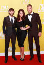 Double CMA nominees Lady Antebellum were back in black! The classy trio consisting of (L-R) Charles Kelley, Hillary Scott, and Dave Haywood were also among the night's performers. (11/1/2012)