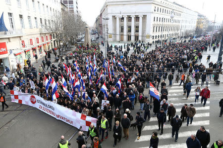 People walk during the protest against the ratification of the Istanbul Convention in Zagreb, Croatia, March 24, 2018. REUTERS/Antonio Bronic