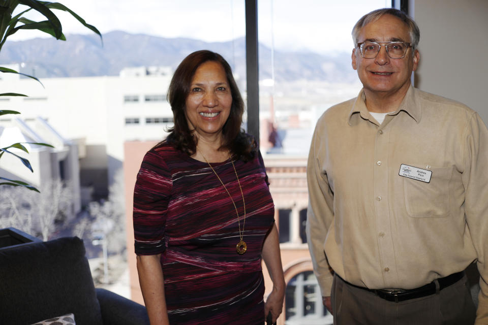 In this Dec. 13, 2019, photograph, Colorado Springs, Colo., council members Yolanda Avila and Andres Pico are shown in a city office in Colorado Springs, Colo. Hispanic voters are heavily Democratic but Hispanic men are more likely to vote Republican than Hispanic women. This gender gap is roughly the same size as the one among white voters. Avila and Pico are friends who sit next to each other on the Colorado Springs' city council. But politically the two couldn't be further apart, Avila is a durable Democrat and Pico an unflinching Republican. (AP Photo/David Zalubowski)