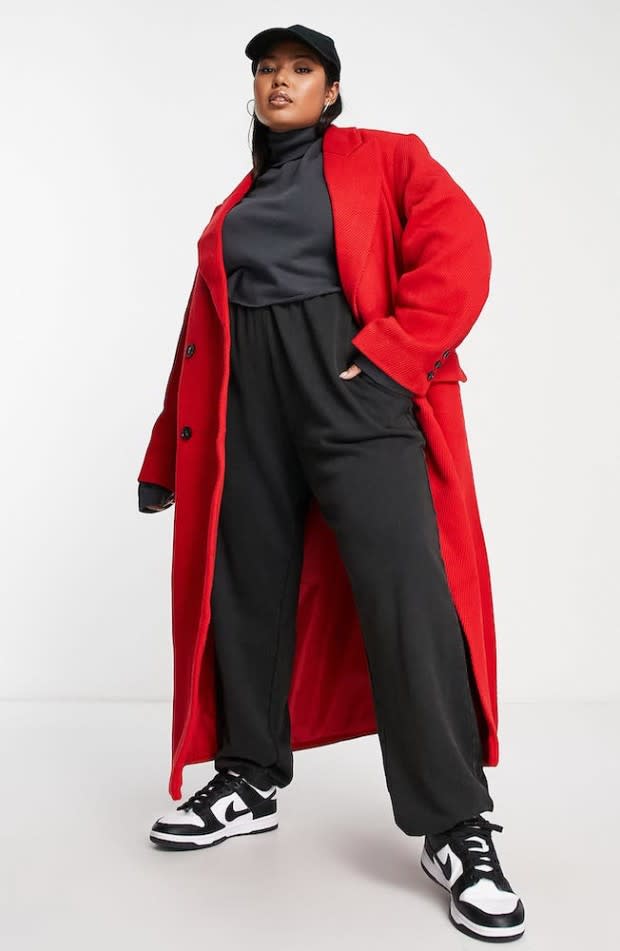 <p>Nordstrom</p><p>The ASOS Design Curve Twill Longline Coat is the kind of piece that makes an entire outfit (even if you’re just wearing leggings and a crewneck sweatshirt underneath). The textured twill looks simultaneously luxurious and casual, meaning you can layer it over just about anything in your closet.</p>