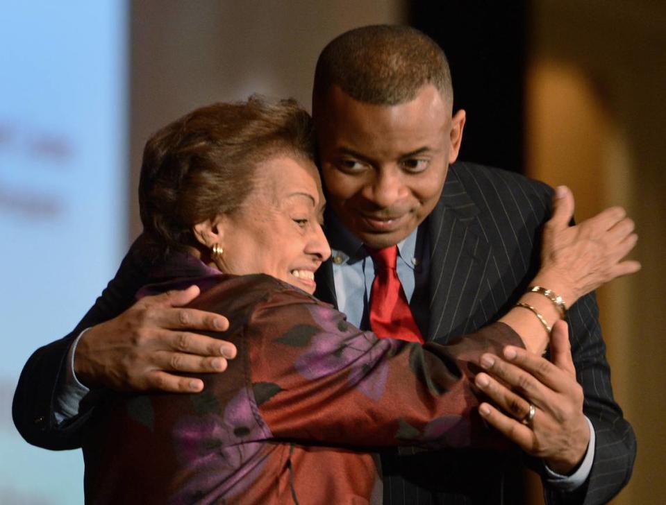 Jeanne Brayboy, photographed in 2012 with then-Charlotte mayor Anthony Foxx, as she received an award from the Harvey B. Gantt Center.