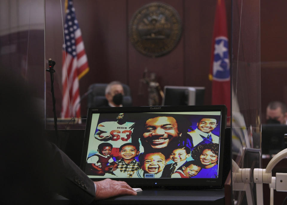 Taurean Sanderlin's photo appears on a screen during the victim impact statements at Justice A.A. Birch Building in Nashville, Tenn. on Saturday, Feb. 5, 2022. Jurors are hearing testimony about whether or not to make parole possible after 51 years in prison for Travis Reinking, the man who shot and killed four people at a Nashville Waffle House in 2018. Jurors on Friday rejected Reinking’s insanity defense as they found him guilty on 16 charges, including four counts of first-degree murder. (Nicole Hester/The Tennessean via AP, Pool)
