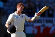 Cricket - Test Match - New Zealand v England - Eden Park, Auckland, New Zealand, March 25, 2018. New Zealand's Henry Nicholls celebrates after reaching his century during the fourth day of the first cricket test match. REUTERS/David Gray