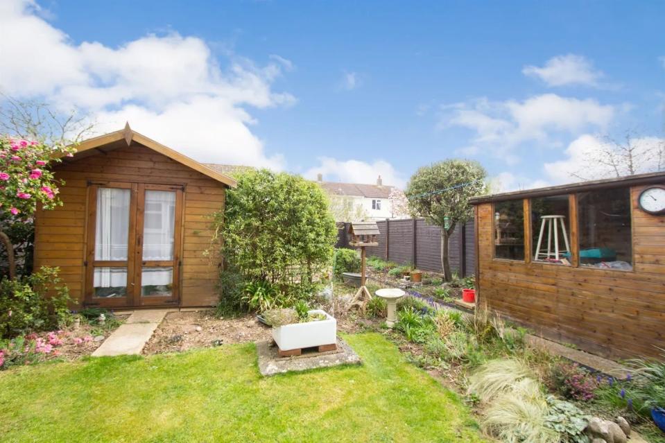 <p>Head outside and you'll find everything from mature plants to a pretty wooden summer house — perfect for little ones to frolic in. </p><p><strong>Like this article? <a href="https://hearst.emsecure.net/optiext/cr.aspx?ID=DR9UY9ko5HvLAHeexA2ngSL3t49WvQXSjQZAAXe9gg0Rhtz8pxOWix3TXd_WRbE3fnbQEBkC%2BEWZDx" rel="nofollow noopener" target="_blank" data-ylk="slk:Sign up to our newsletter;elm:context_link;itc:0;sec:content-canvas" class="link ">Sign up to our newsletter</a> to get more articles like this delivered straight to your inbox.</strong></p><p><a class="link " href="https://hearst.emsecure.net/optiext/cr.aspx?ID=DR9UY9ko5HvLAHeexA2ngSL3t49WvQXSjQZAAXe9gg0Rhtz8pxOWix3TXd_WRbE3fnbQEBkC%2BEWZDx" rel="nofollow noopener" target="_blank" data-ylk="slk:SIGN UP;elm:context_link;itc:0;sec:content-canvas">SIGN UP</a></p><p>Love what you’re reading? Enjoy <a href="https://go.redirectingat.com?id=127X1599956&url=https%3A%2F%2Fwww.hearstmagazines.co.uk%2Fhb%2Fhouse-beautiful-magazine-subscription-website&sref=https%3A%2F%2Fwww.housebeautiful.com%2Fuk%2Flifestyle%2Fproperty%2Fg36274485%2Fzoopla-homes-for-sale-pretty-gardens%2F" rel="nofollow noopener" target="_blank" data-ylk="slk:House Beautiful magazine;elm:context_link;itc:0;sec:content-canvas" class="link ">House Beautiful magazine</a> delivered straight to your door every month with Free UK delivery. Buy direct from the publisher for the lowest price and never miss an issue!</p><p><a class="link " href="https://go.redirectingat.com?id=127X1599956&url=https%3A%2F%2Fwww.hearstmagazines.co.uk%2Fhb%2Fhouse-beautiful-magazine-subscription-website&sref=https%3A%2F%2Fwww.housebeautiful.com%2Fuk%2Flifestyle%2Fproperty%2Fg36274485%2Fzoopla-homes-for-sale-pretty-gardens%2F" rel="nofollow noopener" target="_blank" data-ylk="slk:SUBSCRIBE;elm:context_link;itc:0;sec:content-canvas">SUBSCRIBE</a></p>