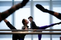 Shanghai Ballet dancers wearing masks practise in a dance studio in Shanghai