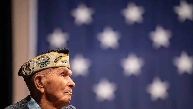 Pearl Harbor survivor Dick Higgins listens to a speaker during a ceremony at Bend High School in Bend, Ore., on Dec. 7, 2023, to honor him as well as those who died in the Dec. 7, 1941, attack on Pearl Harbor. Higgins, one of the few remaining survivors of the Japanese attack on Pearl Harbor, died Tuesday, March 19, 2024, at his home in Bend, Ore. He was 102.