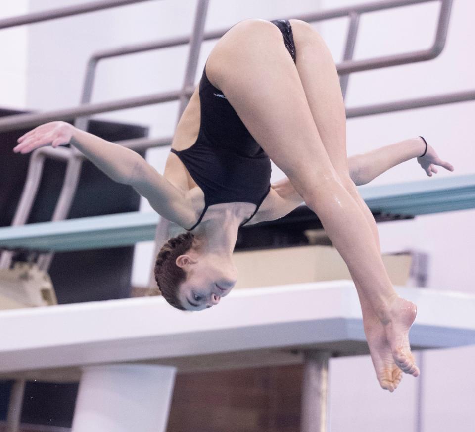 Green's Landry Torres competes in the 2024 OHSAA girls Division I state diving championships at C.T. Branin Natatorium, Wednesday, Feb. 21, 2024.