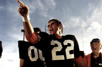 <p>Before he began acting, Reynolds eyed a career playing professional football. After an injury sidelined him while he was playing in college at Florida State, he pursued other options. Perhaps that’s why his portrayal of a former footballer, Paul Crewe, in the 1974 film was so darn good. (Photo:<br>Paramount Pictures/Courtesy of Everett) </p>