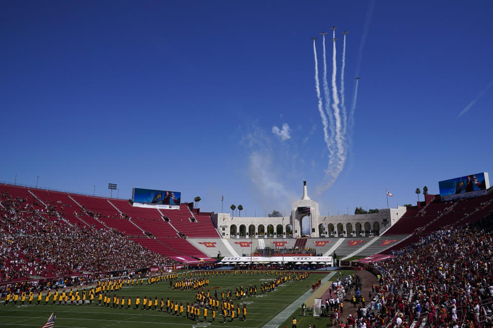 Airplanes fly over Los Angeles Memorial Coliseum before an NCAA college football game between San Jose State and Southern California Saturday, Sept. 4, 2021, in Los Angeles. (AP Photo/Ashley Landis)