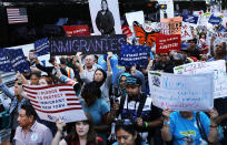 <p>Hundreds of immigration advocates and supporters attend a rally and march to Trump Tower in support of the Deferred Action for Childhood Arrivals program also known as DACA on Aug. 30, 2017, in New York City. Immigrants and advocates across the country are waiting to hear President Trump’s decision on whether he will keep DACA, which allows young people who immigrated to the U.S. as children to temporarily escape deportation and receive other benefits, started under President Barack Obama in 2012. (Photo: Spencer Platt/Getty Images) </p>