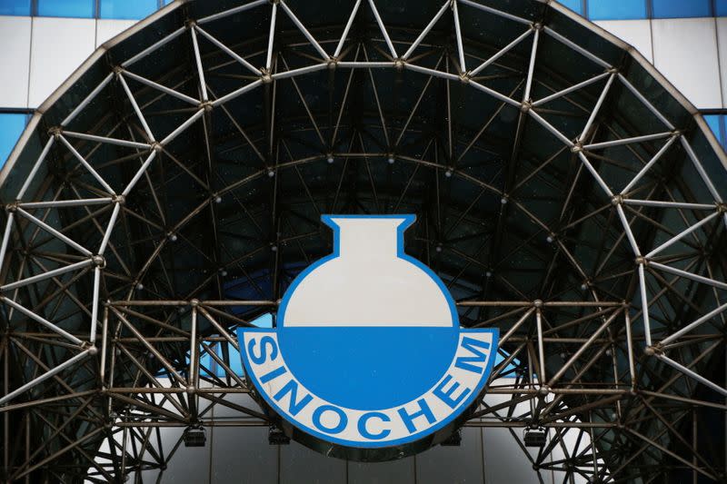 A logo of Sinochem is seen outside an office building of Sinochem in Beijing